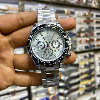 The ROLEX Daytona is a timeless classic designed for those who appreciate luxury and performance. Featuring a date-working dial and master lock, this second-copy model offers a bold, attractive look in fresh new colors — perfect for both casual outings and formal occasions. Key Features: ⌚ Date Working Dial – Stay on track with precision 🔒 Master Lock – Secure and comfortable fit 🎨 New Attractive Colours – Choose your perfect style 💯 Premium Finish – Smooth edges & detailed casing Care Instructions: Avoid exposure to strong magnetic fields and clean with a soft cloth. Why Choose This Product: Combines functionality with style, perfect for both casual and formal occasions. 💸 Price: PKR 3,500/- Only 📦 Includes Normal Box | Free Delivery & 7-Day Return Policy